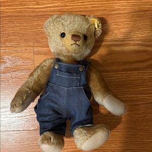 Vintage Steiff teddy bear with denim overalls. Button in Ear German Mohair